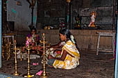 Worship and puja offerings inside the Swamimalai temple. 